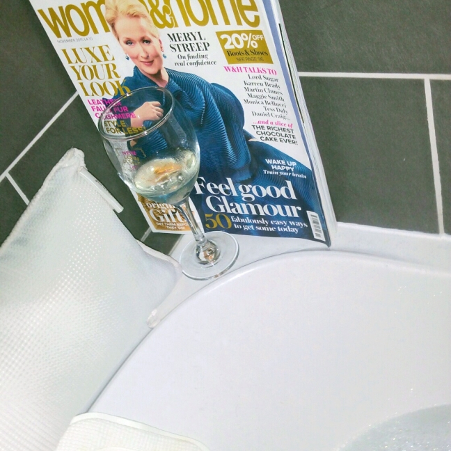 in the bath with woman and home  magazine