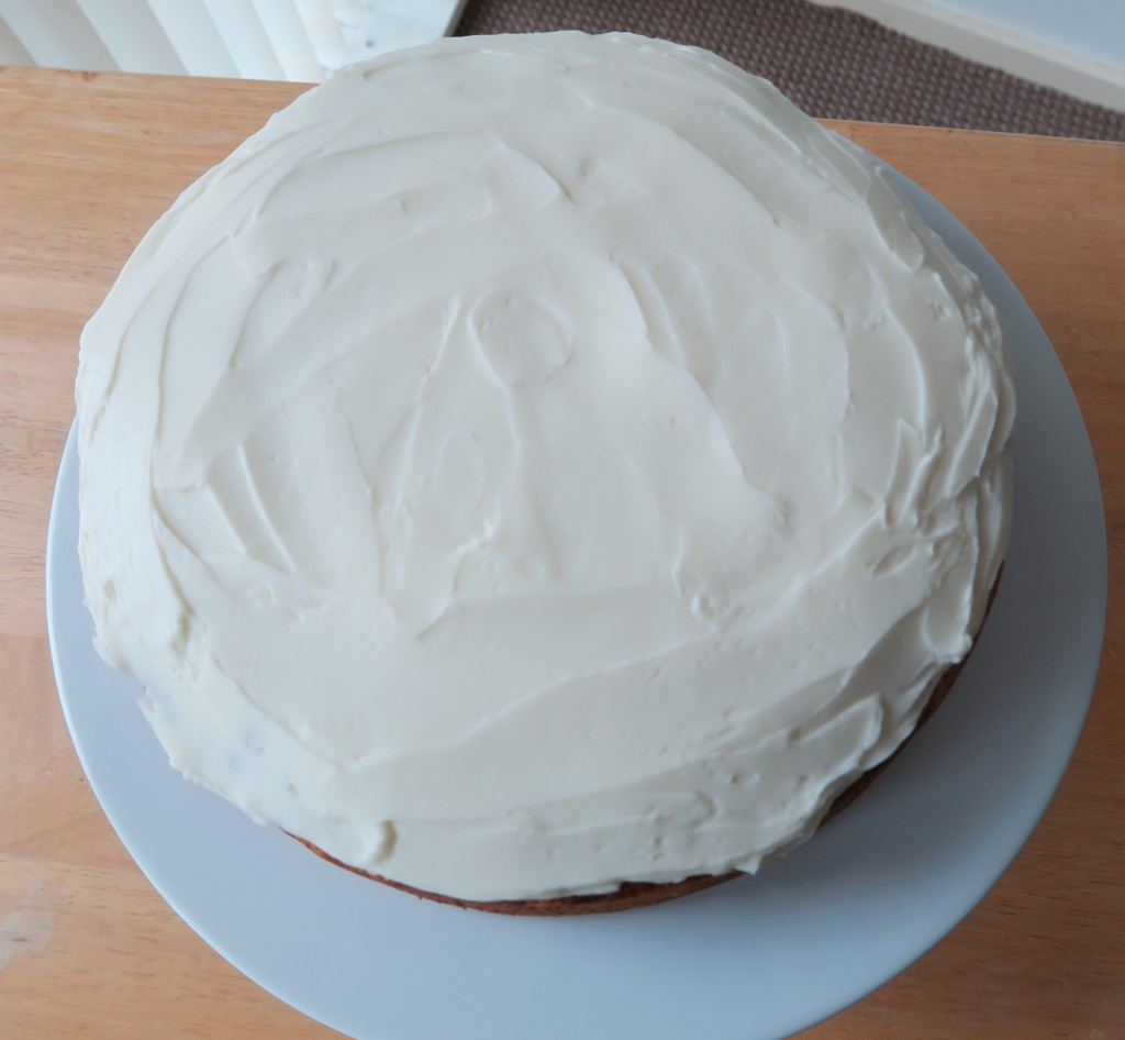 Courgette cake covered in mascarpone cheese and icing sugar