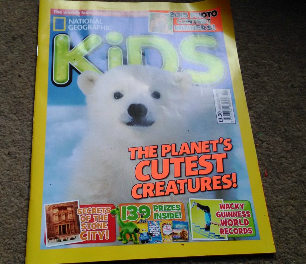 A baby polar bear on the cover of National Geographic Kids