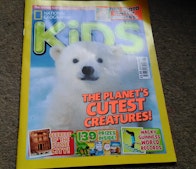 A baby polar bear on the cover of National Geographic Kids