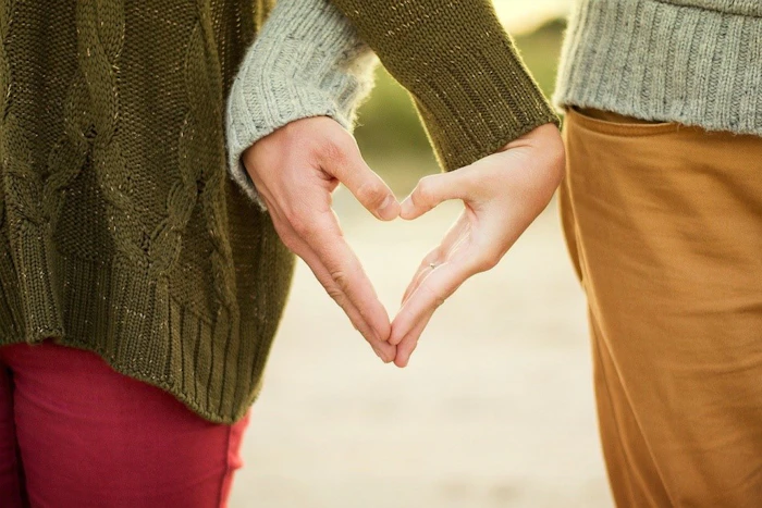 Two hands forming a heart