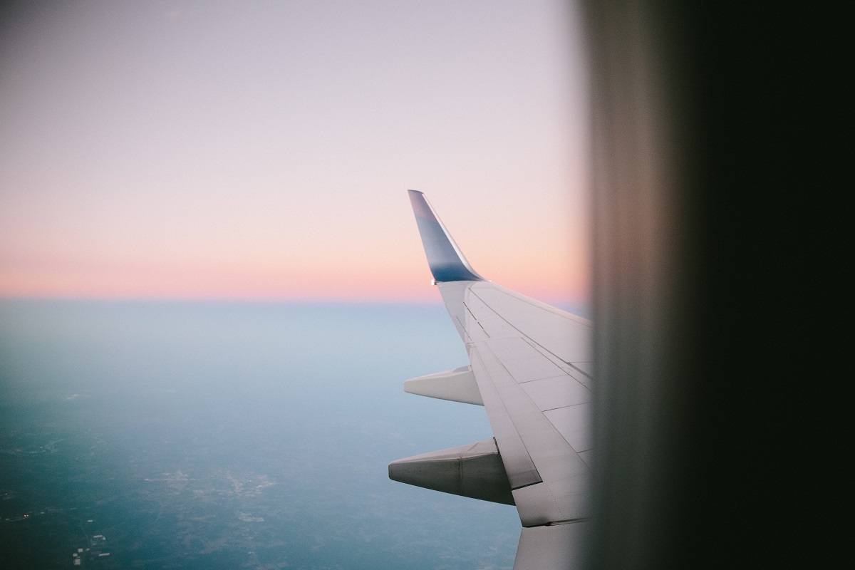 Plane Window photo by Freddy Castro on Unsplash