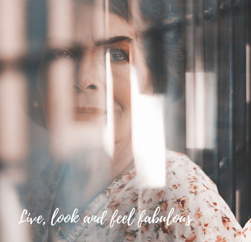 women looking out of the window with the platinum magazine quote